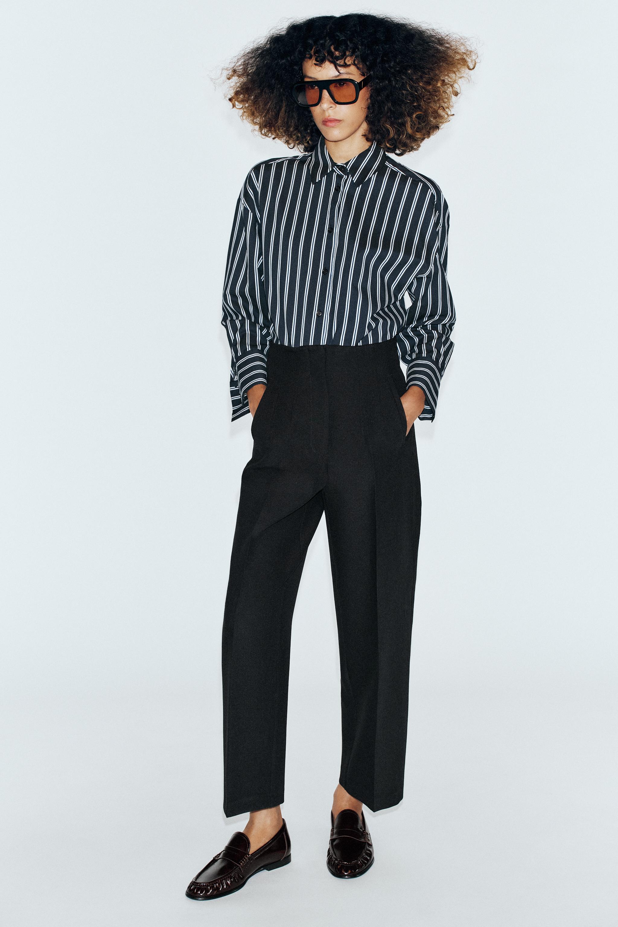 HIGH-RISE BARREL-LEG PANTS